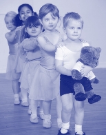 Photo of pre-school girls and boys and Milligan Bear