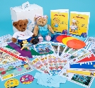 Melody Bear sits with the box that contains her teaching syllabus