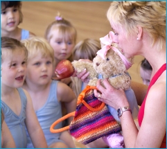 Photo of Jill Bridger showing the class Melody Bear's apple copyright M Ewing