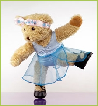 Photo of Melody Bear balancing in her tap shoes
